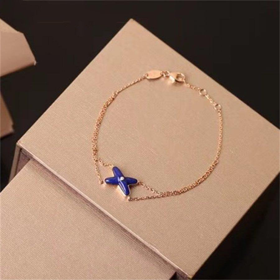 [Royal&Vicky]Hollow Design Four-Leaf Clover Flower Shape Bracelet